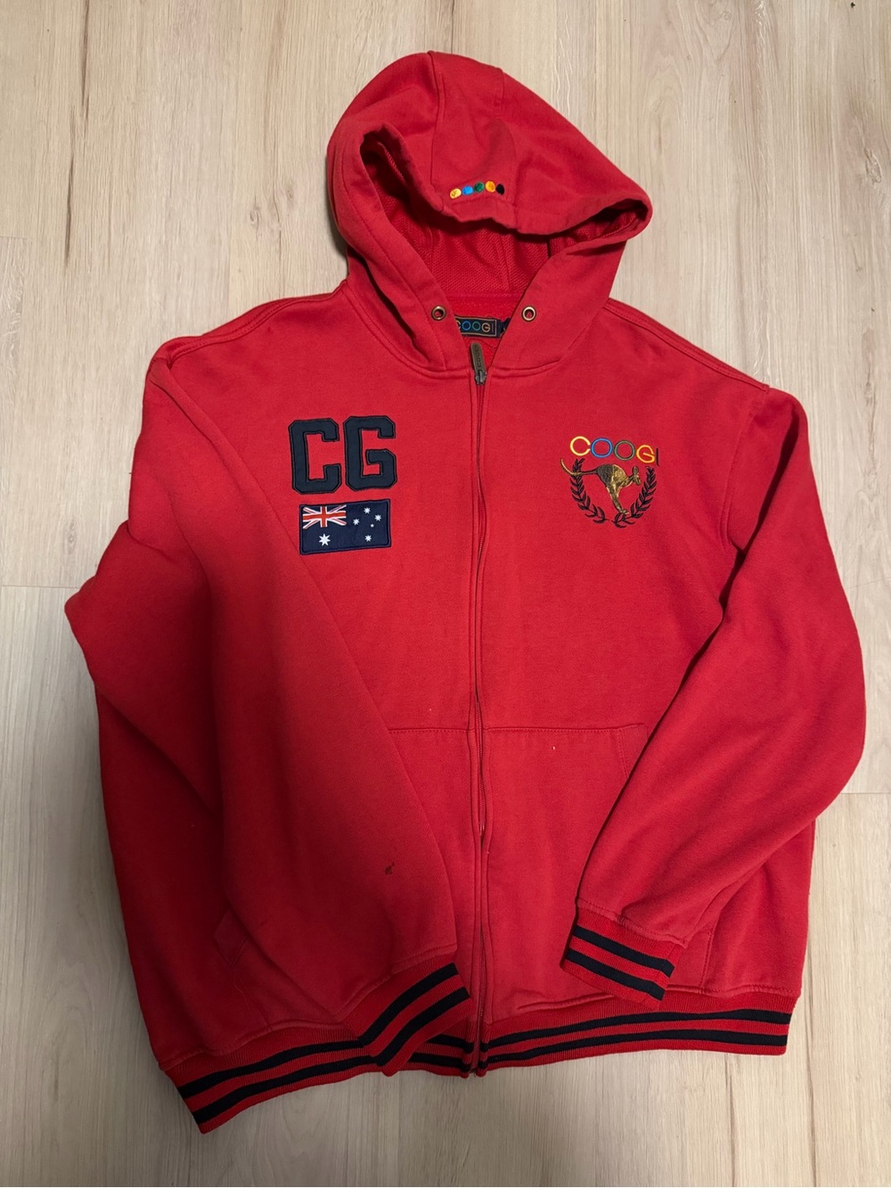 COOGI Red Hooded Zip Jacket with Embroidered Crest